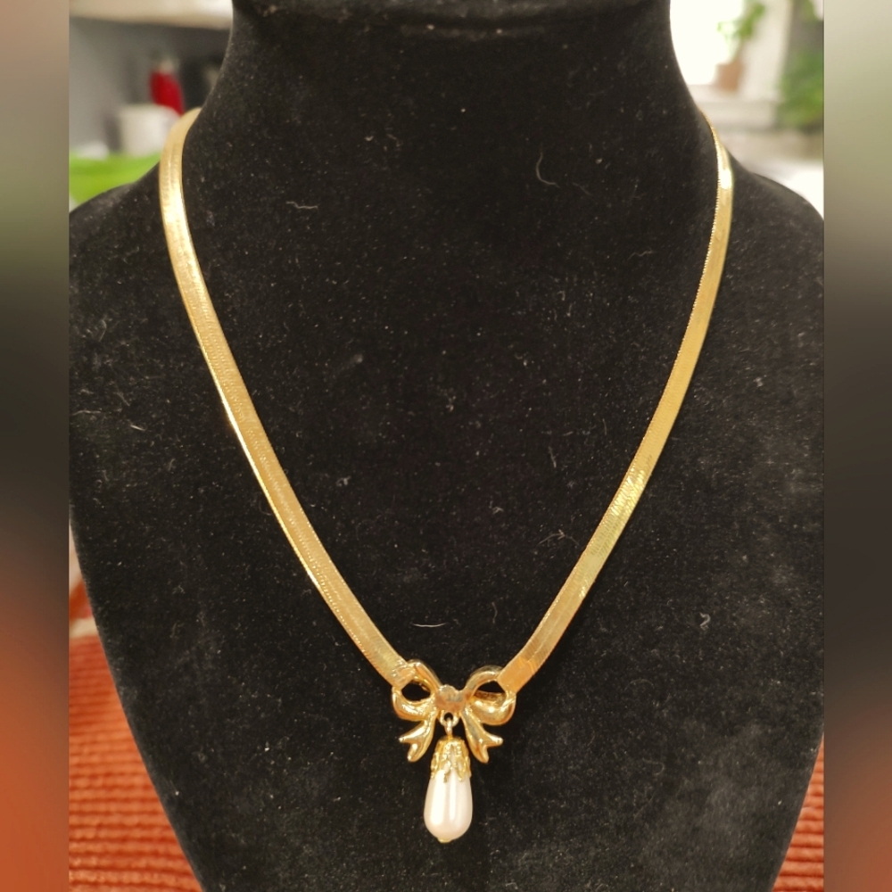Gold Tone Bow Necklace by Luminess with faux pearl drop